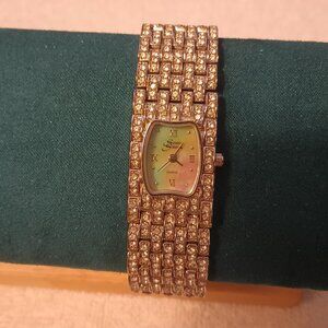Suzanne Somers silver tone watch with diamond accents.